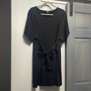 Like new condition Express dress with tie waist in the front.
